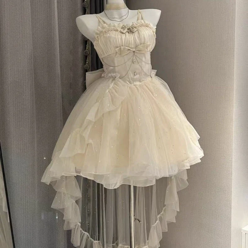 dress + skirt support + trailing + bow + chain